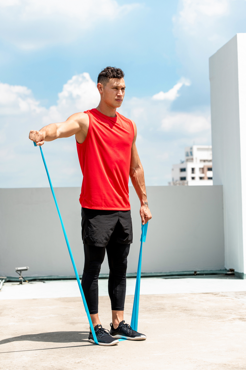 Handsome,Sports,Man,Doing,Shoulder,Lateral,Raise,Exercise,With,Resistance